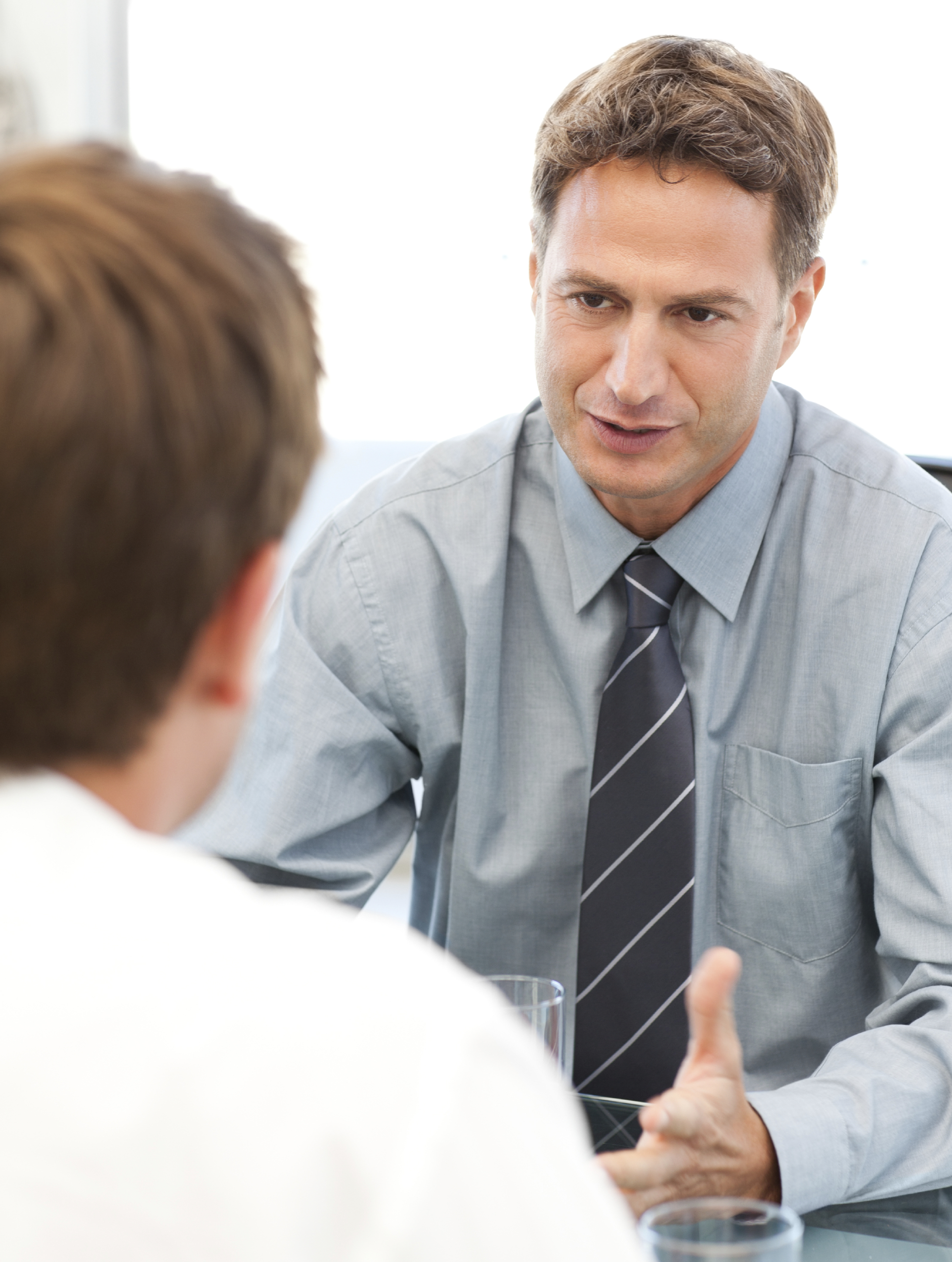 Charismatic manager during a meeting with an employee at the office